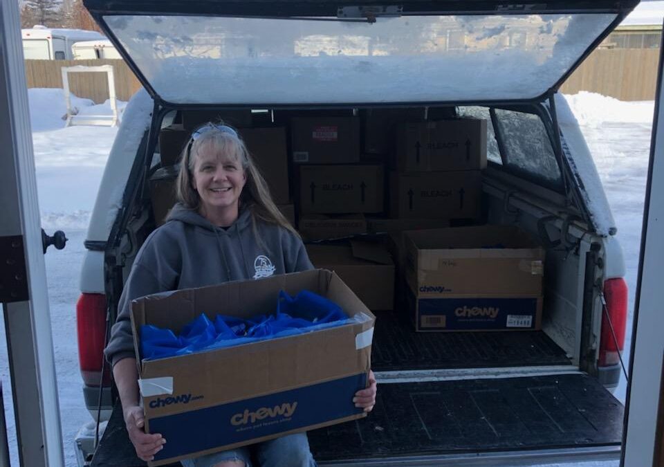 Volunteer Kelly drops off donations to Columbia Falls District schools.